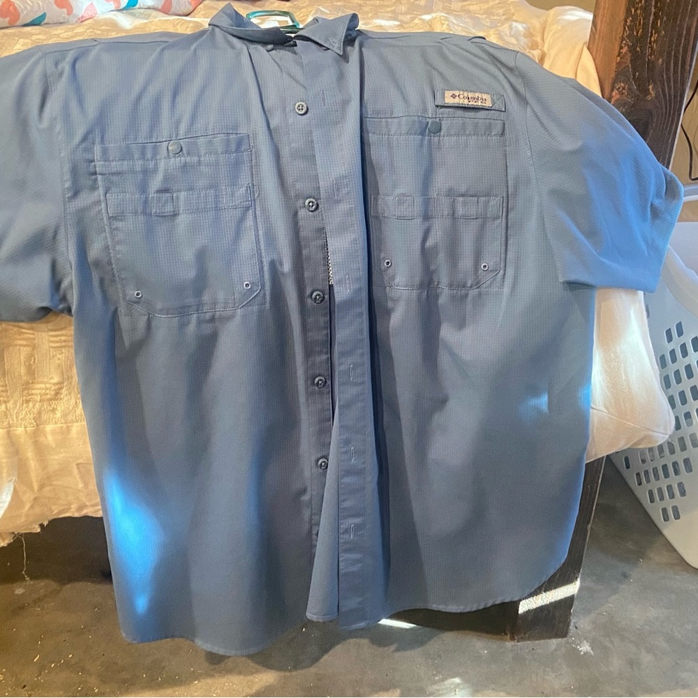 Columbia PFG button down shirt, size large and blue in color